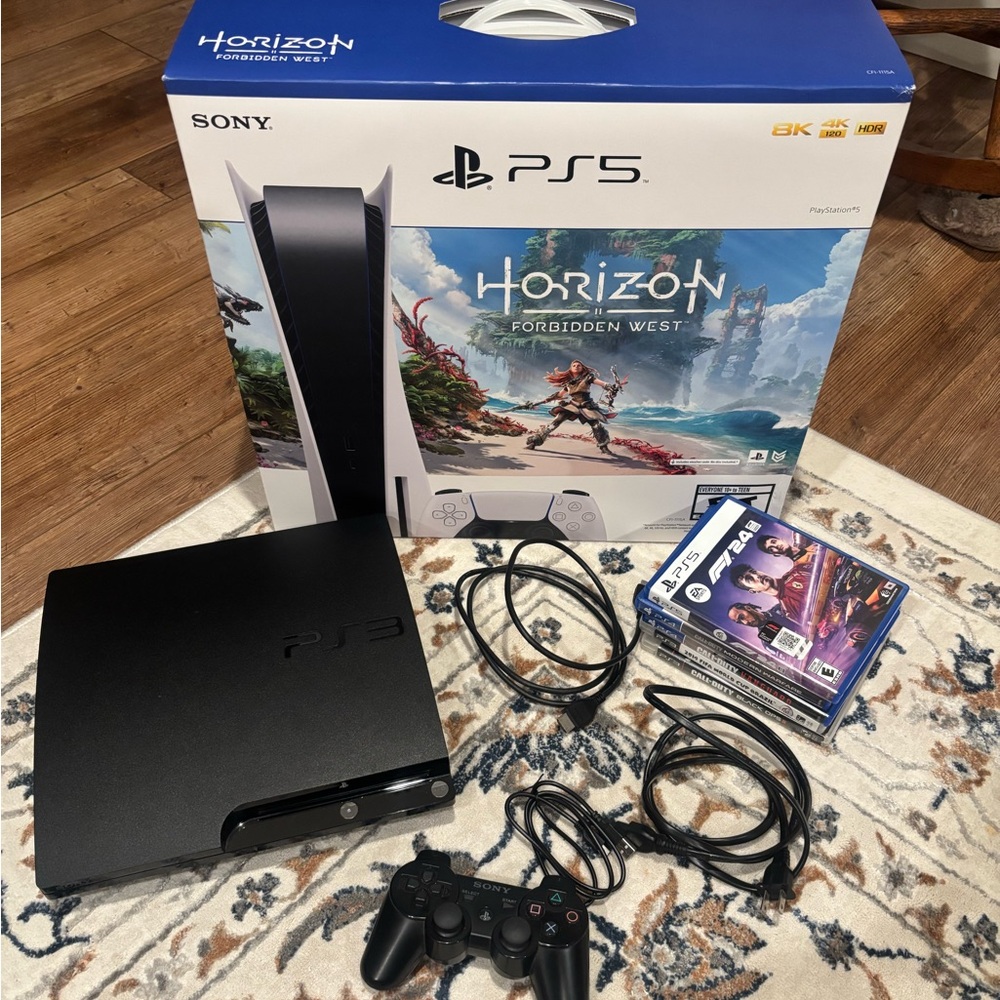 PS3 With games, cords and controllers